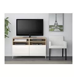 BESTÅ - Meja TV dengan pintu, efek kayu oak diwarnai putih/Selsviken/Nannarp high-gloss/putih, 120x42x74 cm