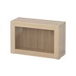 BESTÅ - Unit rak dengan pintu kaca, efek kayu oak diwarnai putih/Sindvik kaca bning ksan kayu oak dwrnai pth, 60x22x38 cm
