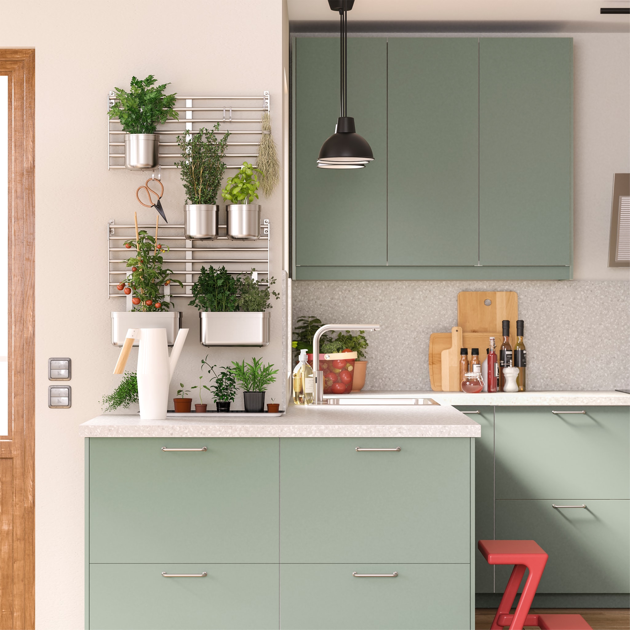  Grey-green kitchen with wall-mounted wall grids in stainless steel with plant pots that hold different herbs and vegetables.