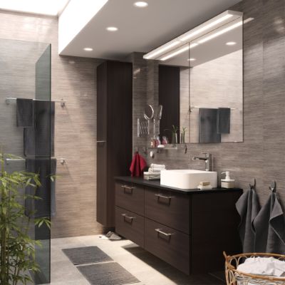 Bathroom with a streamlined, seamless look thanks to two GODMORGON wash stands and a GODMORGON high cabinet in black-brown.