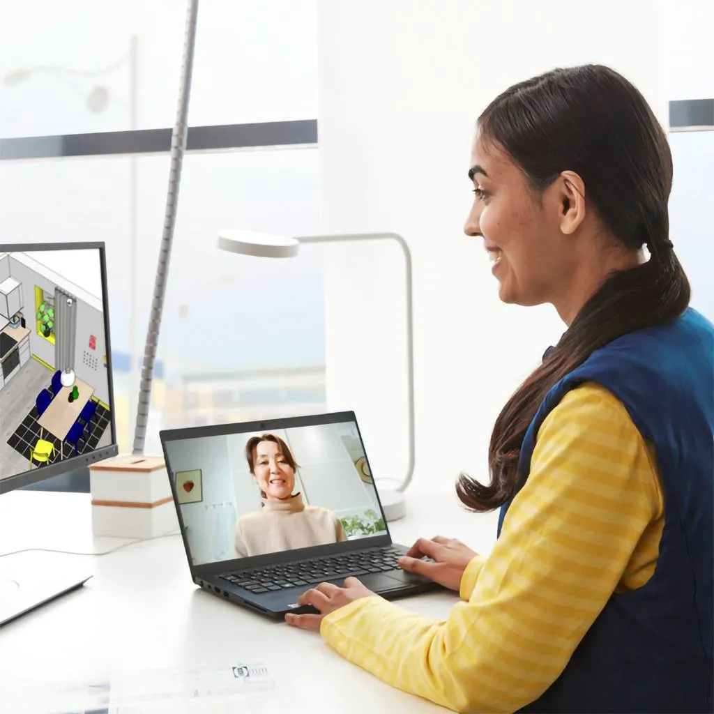 Person designing on a laptop