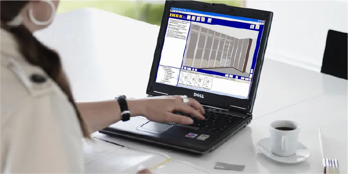 Person designing on a laptop