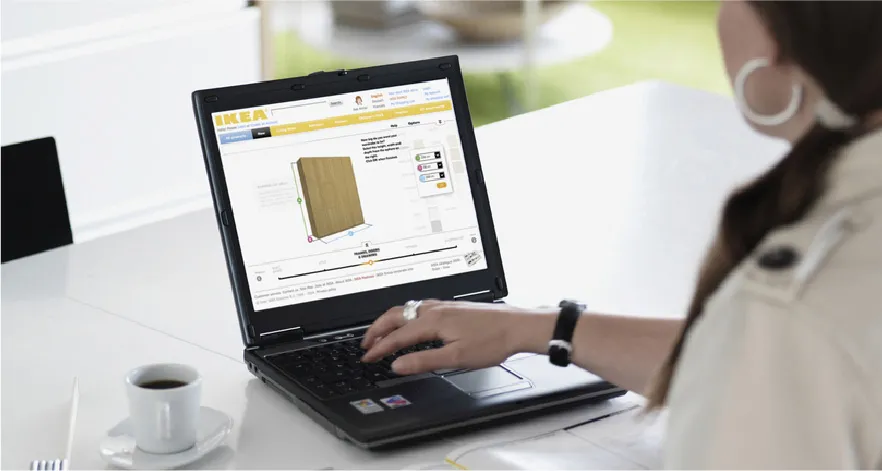 Person designing on a laptop