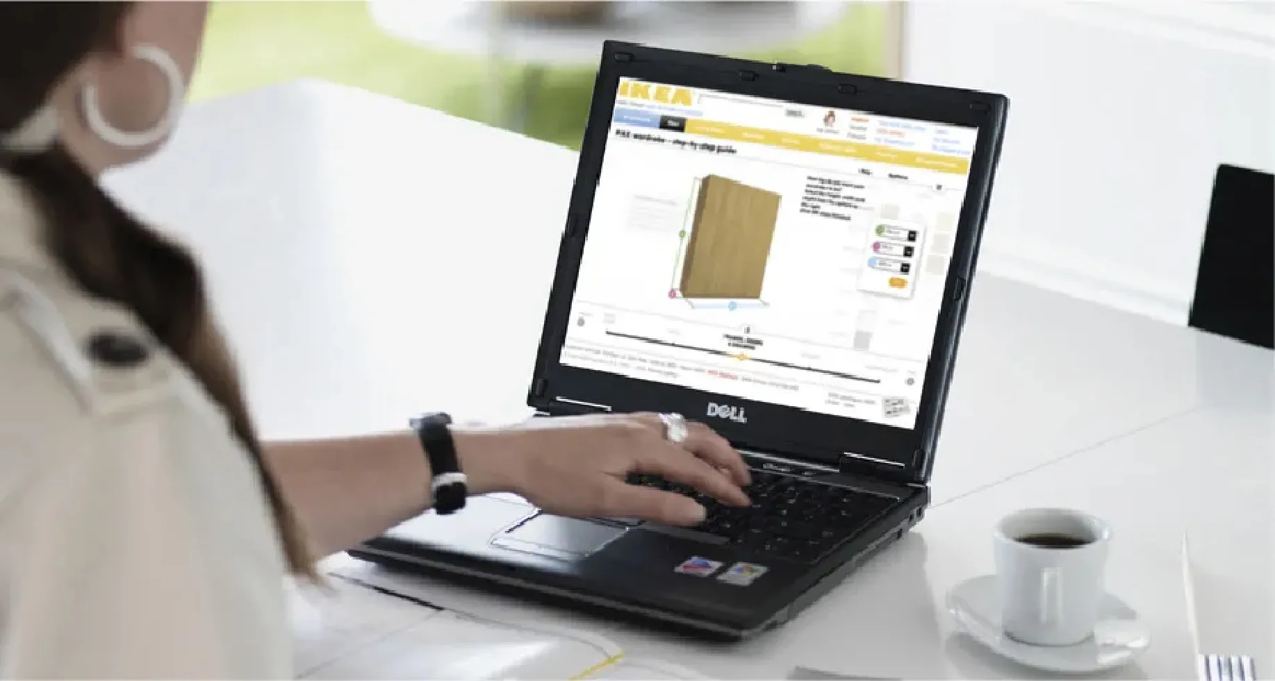 Person designing on a laptop