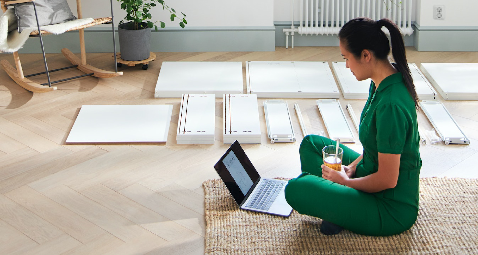 Person designing on a laptop