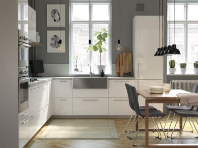 A modern, bright, and airy kitchen with wooden details